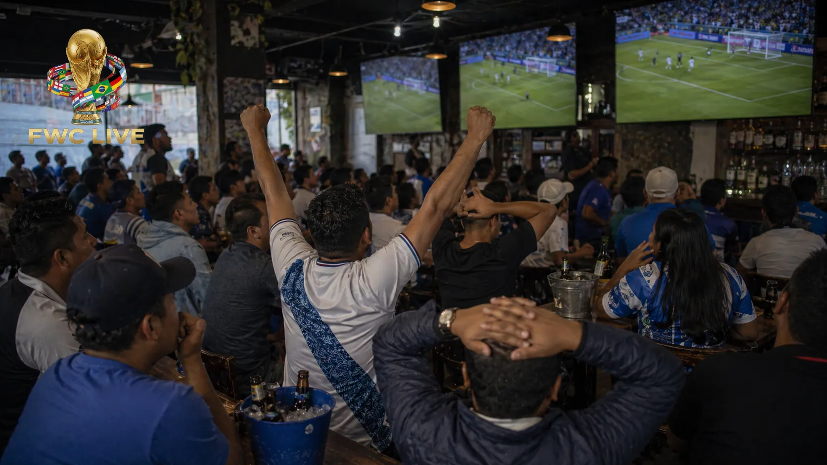 Guatemala football fans watching FIFA World Cup 2026 coverage in a Guatemala City sports bar