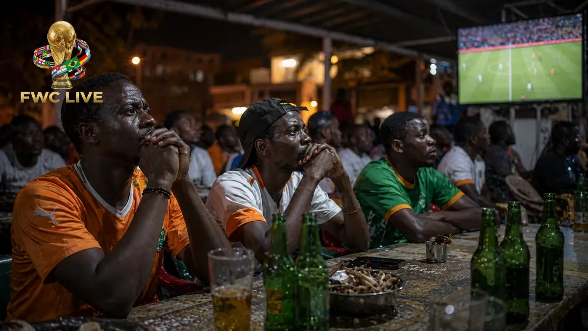 Ivory Coast football fans watching FIFA World Cup 2026 coverage in an Abidjan cafe