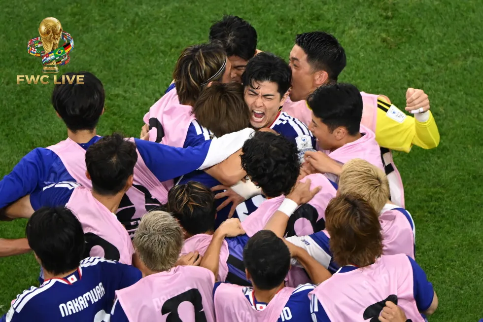 Japan celebrating after Daichi Kamada's late equalizer against the Netherlands