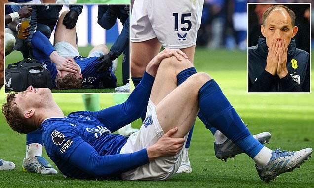 Jarrad Branthwaite leaving the pitch injured during Everton action